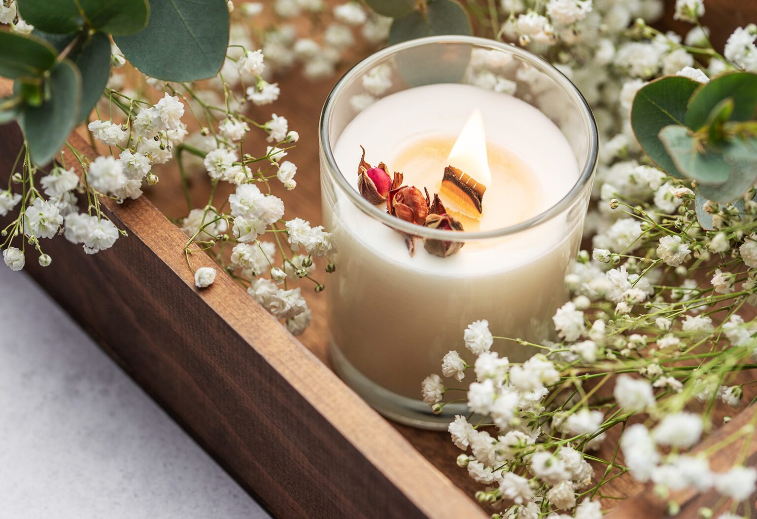 Aromatic candle on the table. Soy candles in a jar. Aromatherapy and relax in spa and home. Still life.